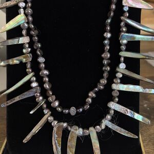 Abalone and Pearl statement layered necklace appears to be native .